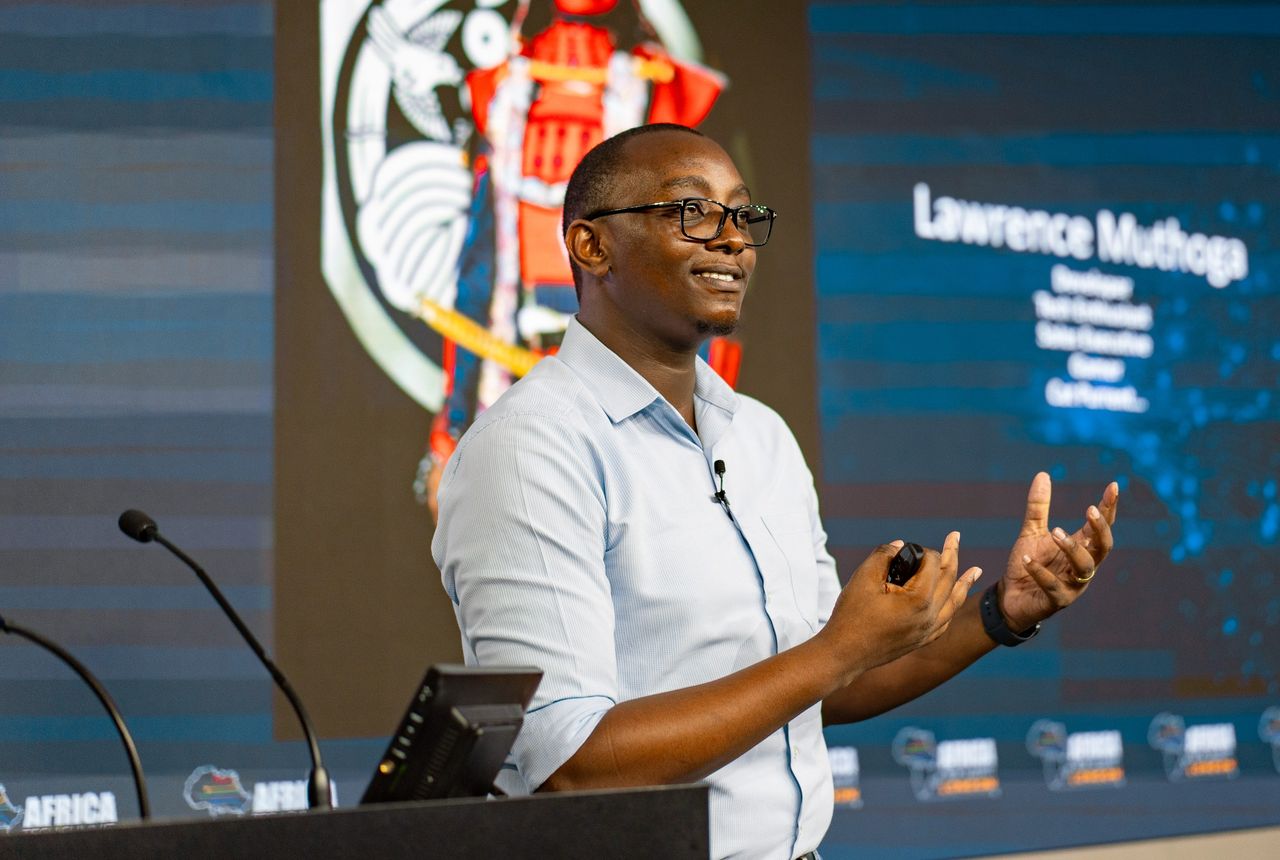 Lawrence Muthoga speaking on stage at Africa Tech Summit London