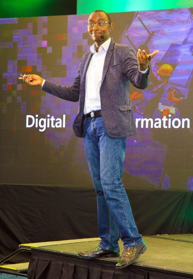 Lawrence Muthoga presenting on stage at a CIO East Africa digital transformation conference